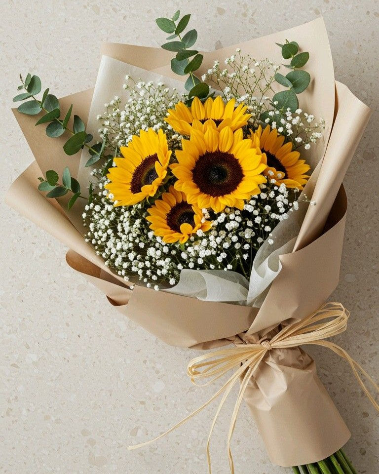 Bouquet di girasoli con gypsophila ed eucalipto